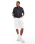 ASOS DESIGN relaxed boxy shirt with short sleeves and contrast stitch in black