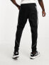 adidas Football Tiro tracksuit joggers in black