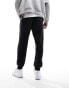 Фото #6 товара Jordan Essentials fleese joggers in black