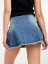 Tammy Girl mid rise distressed denim mini skirt with buckle details