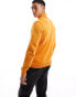 ASOS DESIGN midweight knitted cotton roll neck jumper in orange