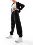 Фото #1 товара The Couture Club teddy fleece joggers in black