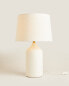 Table lamp with white ceramic base