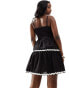 In The Style contrast trim tiered mini cami dress in black