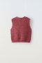 Open-knit vest