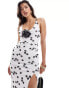 ASOS DESIGN strappy midi dress with contrast corsage in polka dot