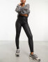 New Look coated skinny jeans in black