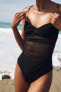 Draped swimsuit with tulle