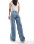 Фото #2 товара Monki Paz mid waist loose wide leg jeans in mid blue