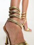 ASOS DESIGN – Neo – Sandaletten in Gold mit gewickeltem Knöcheldetail