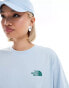 The North Face Flower backprint oversized t-shirt in light blue exclusive to ASOS