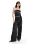 SNDYS satin cami tie back detail top with contrast bust seam detail co-ord in black