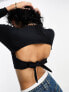 Фото #1 товара ASOS DESIGN long sleeve crop top with tie back in black