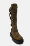 Leather knee-high boots with buckles