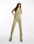 ASOS DESIGN twill belted zip front sleeveless jumpsuit in geo print