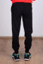 Фото #3 товара Брюки мужские PUMA 586716-51 черные с эластичным поясом и манжетами