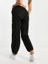 New Look parachute pants in black