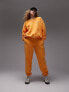 Фото #1 товара Topshop co-ord nyc project puff printed vintage wash oversized jogger in orange