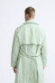 Creased-effect trench coat