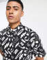 ASOS DESIGN stretch slim shirt in black abstract print