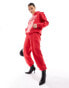 Фото #1 товара Murci exclusive saint motif joggers co-ord in red