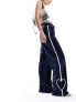 Monki heart stripe straight leg track pant trouser in navy and white