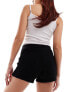 Фото #9 товара Tommy Jeans badge knit shorts in black