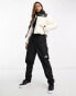 The North Face Saikuru cropped puffer in cream Exclusive at ASOS XL - фото #4