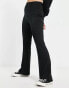 Фото #1 товара Vila stretch flared trousers in black