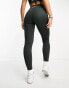 New Balance Linear Heritage high waisted leggings in washed black