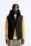 Padded gilet with hood