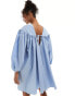 Фото #3 товара ASOS DESIGN extreme gathered smock mini dress with exaggerated sleeve and bow back in blue