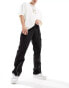 Фото #2 товара Sean John script logo wide leg cargo trousers in black with front hem split