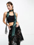 ASOS DESIGN 70s skinny scarf with tassels in dark green