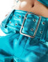 Annorlunda faux leather metallic buckle detail shorts in blue