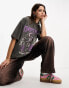 Фото #1 товара ASOS DESIGN boyfriend fit t-shirt with purple rock graphic in washed black