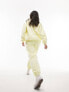 Topshop – East Mercer – Bestickte Oversize-Jogginghose in Gelb mit Bündchen und Vintage-Waschung, Kombiteil