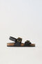 Buckled leather sandals