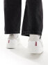 Levi's Swift leather trainer in white with cream suede backtab