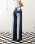 Фото #2 товара Cheap Monday Poser mid rise wide leg skater jeans with extreme spray in rinse wash blue