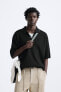 Oversize knit polo shirt