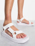 Фото #1 товара Levi's Cadys low strap sandal in white with red tab logo