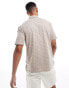 Armani Exchange polo with tonal all over lettering print in beige