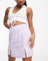 Фото #2 товара Glamorous Petite 90s mini shift skirt in lilac white floral