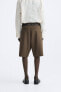 Wide-leg pleated bermuda shorts