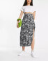 ASOS DESIGN bow detail midi skirt with thigh split in mono smudge print