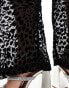 ASOS DESIGN – Transparente Schlupfhose in Schwarz mit Ausbrenner-Animalprint