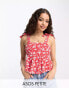 ASOS DESIGN Petite tie strap sun top with pephem in red based ditsy floral print