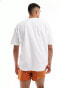 ASOS DESIGN oversized t-shirt with oranges chest print in white