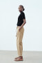 Chino trousers with braided belt